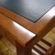 close up of finish and leather on podium