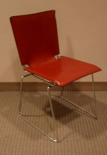 C591 - Funky Red Leather Stack Chairs