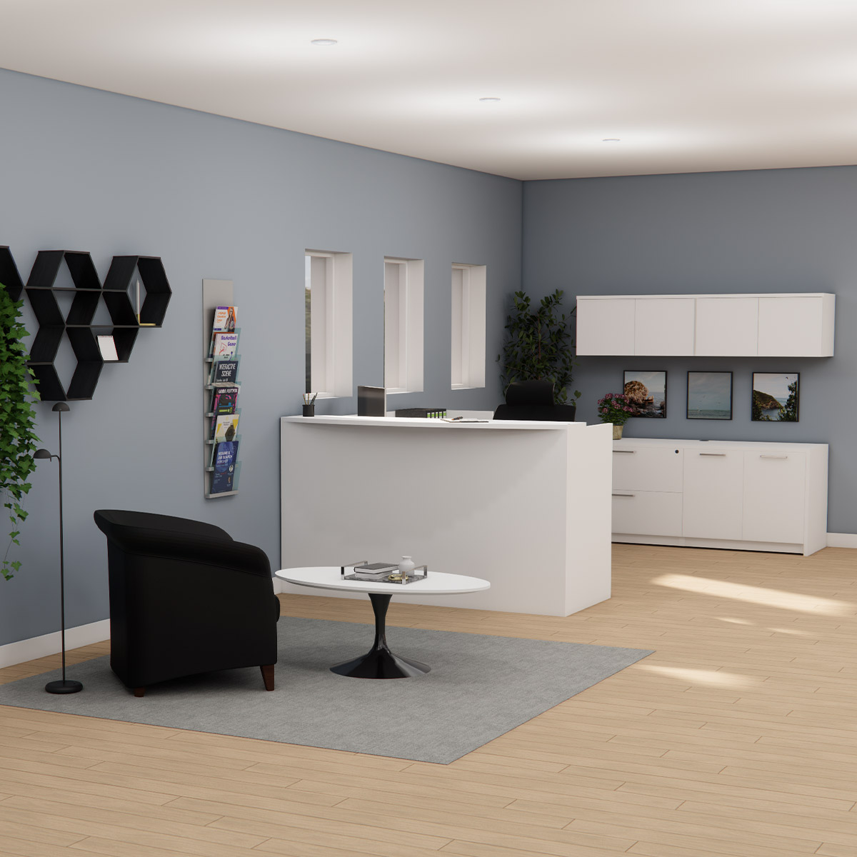 Modern reception area with a sleek white desk and black chair. A round coffee table sits on a gray rug. Walls are light blue with minimalist decor.
