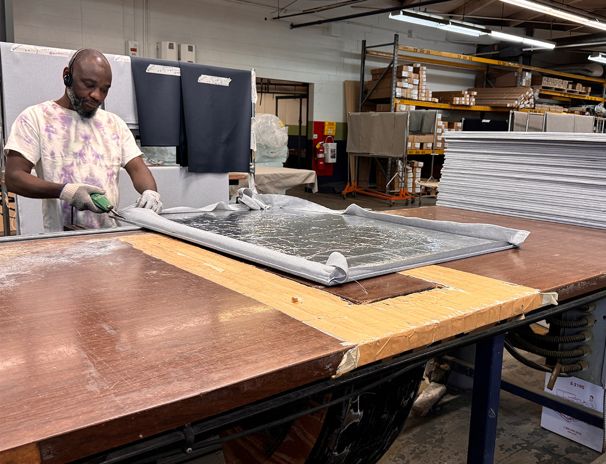 Other in page worker cutting fabric off remanufactured panel for cubicle 1200w x X