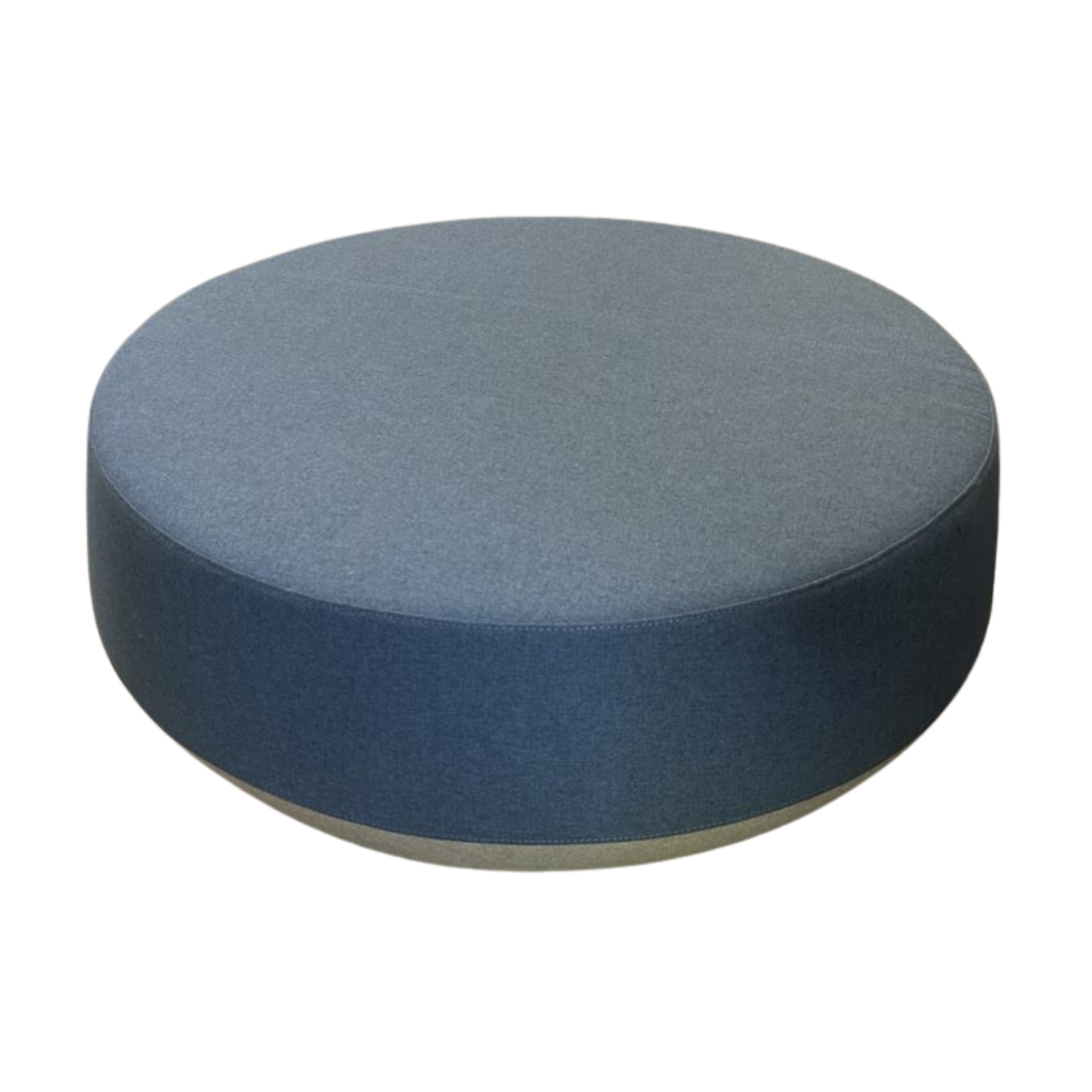 Round blue ottoman with a simple, modern design. The fabric appears smooth and solid-colored, creating a calm and minimalist aesthetic.