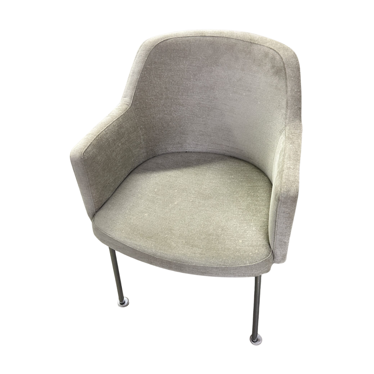 Gray armchair with a curved backrest and simple design. It features metal legs and a cushioned seat, offering a modern and minimalist look.