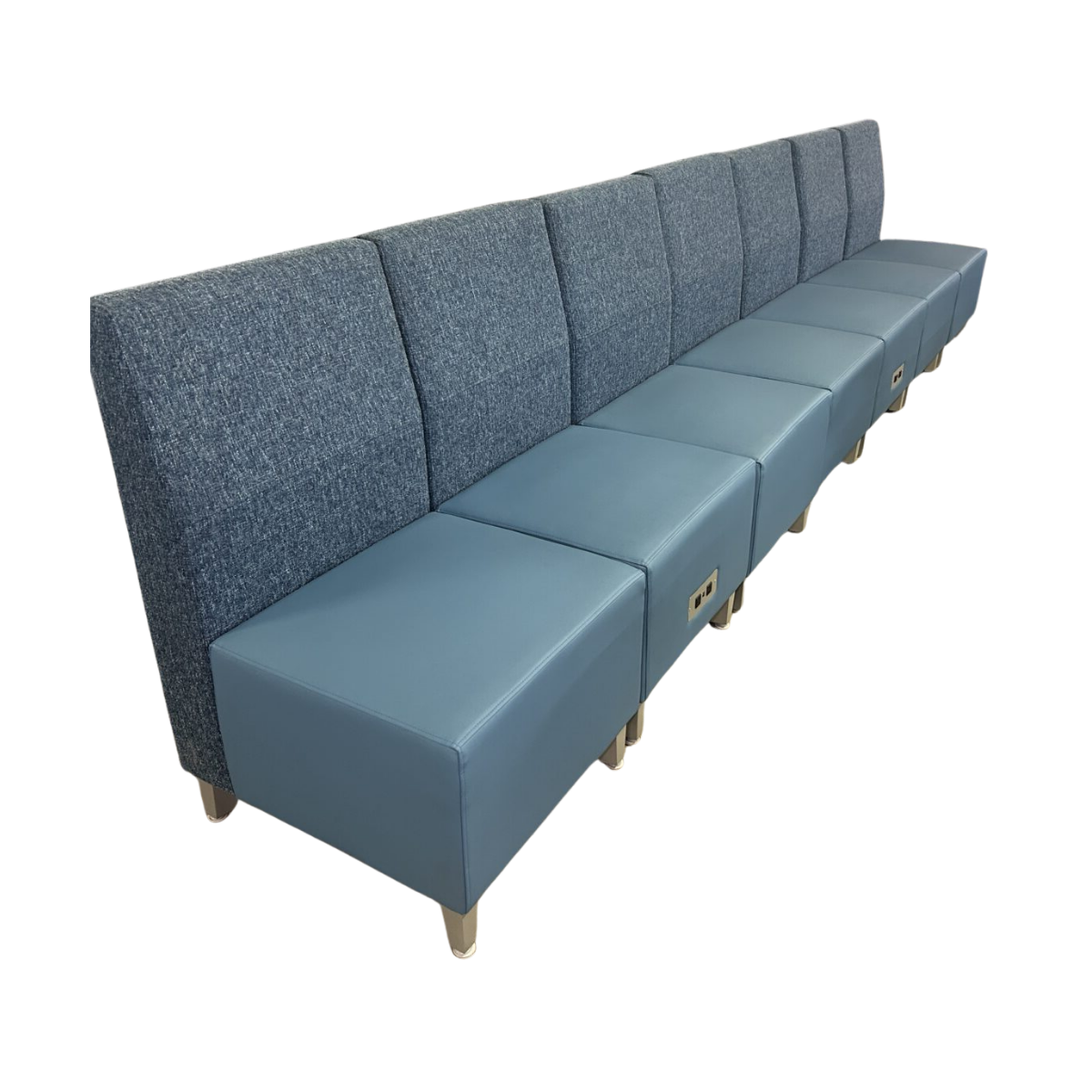 Long blue modular sofa with cushioned seats and backrests. Some seats have power outlets on the side. Modern design, suitable for waiting areas.